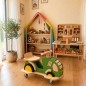 Preview: Holz Traktor BERTI integriert in ein Montessori-Kinderzimmer mit Bauernhof-Spielwelt.